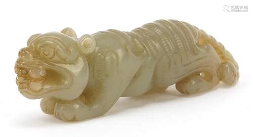 Chinese celadon jade carving of a tiger, 9cm in length