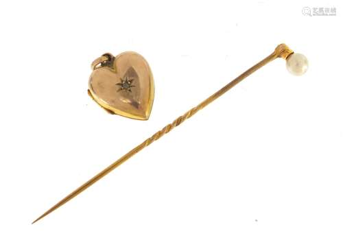 Unmarked gold pearl tie pin and love heart locket set with a...