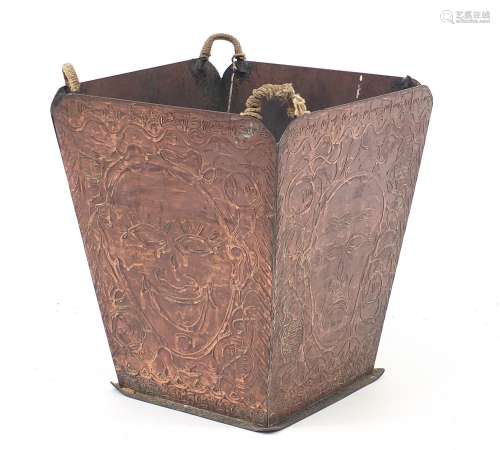 Arts & Crafts copper waist paper basket with Oriental faces,...