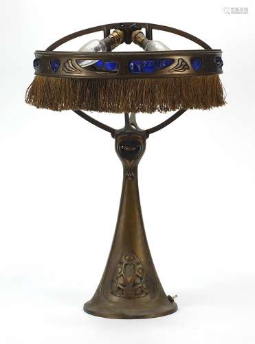 Art Nouveau patinated bronze table lamp with blue rough cut ...