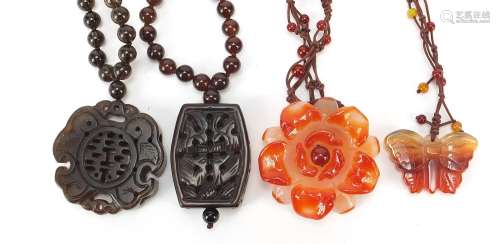Four Chinese hardstone pendant bead necklaces, the largest 6...