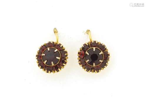 Pair of 9ct gold garnet cluster earrings, 9.5mm in diameter,...