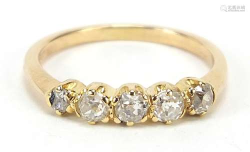 18ct gold graduated diamond five stone ring, housed in a vel...