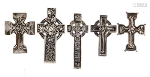 Five silver Celtic cross pendants, the largest 4.6cm high, t...