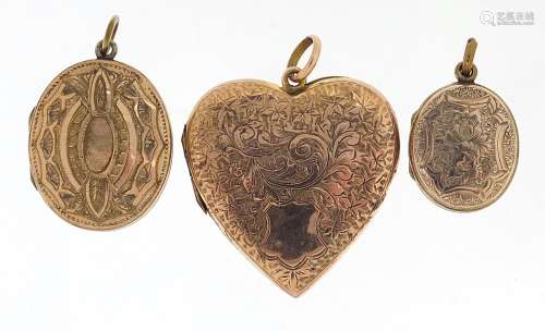 Large gold front and back love heart locket and two other lo...
