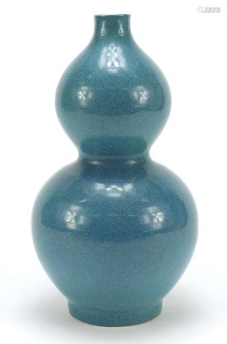 Chinese porcelain double gourd vase having a spotted turquoi...