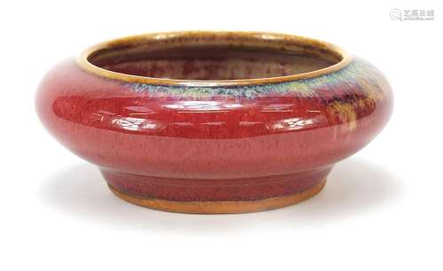 Chinese porcelain brush pot having a sang de boeuf glaze, 10...