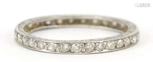 Unmarked white metal diamond eternity ring, size M, 1.3g