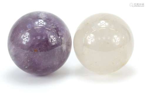 Two fortune teller's crystal balls including an amethyst exa...