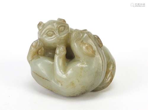 Good Chinese celadon and russet jade carving of two mythical...