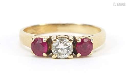 14ct gold diamond and ruby three stone ring, the diamond app...