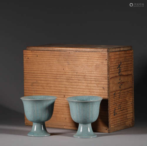 A pair of Qing Dynasty celadon wine cups