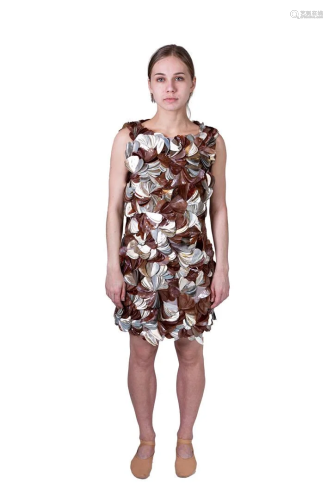Short dress made of shells in brown, cream white and