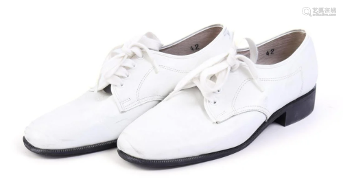 Pair of white leather men's shoes