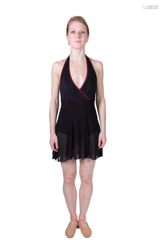 Black ballet dress with red trim. Costume from Hans van