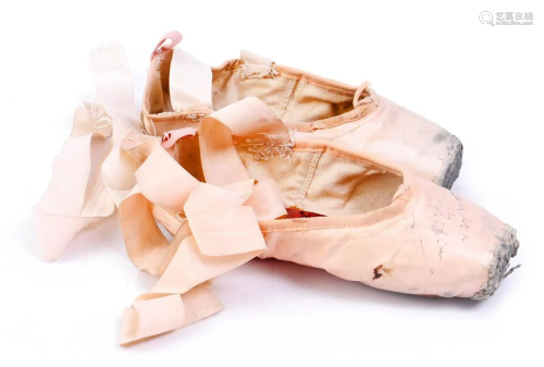 Pair of signed pointe shoes by ballet legend Alexandra