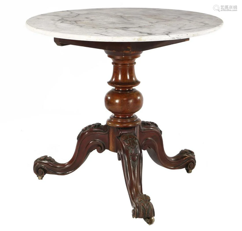 Red table, marble top with carved leg of a dining room