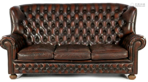 Brown leather padded Chesterfield sofa