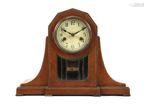 Mantel clock in oak case with faceted diamonds