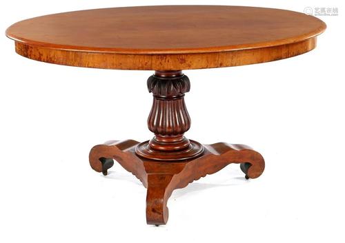 Oval mahogany coffee table on column leg