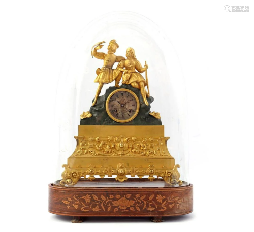 Brass ormolu mantel clock with hunters on top