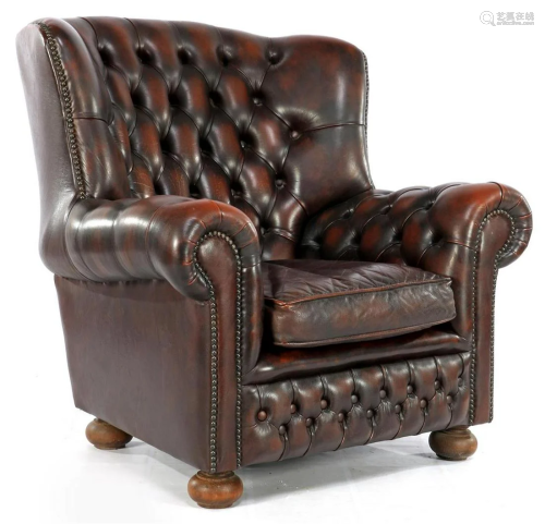 Brown leather Chesterfield armchair