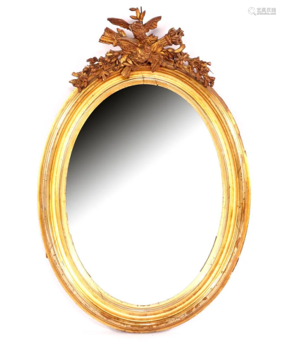 Antique oval mirror in gold-colored frame