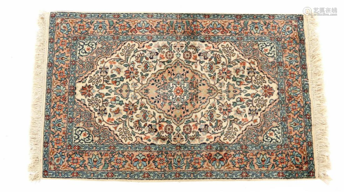 Oriental half-silk hand-knotted rug