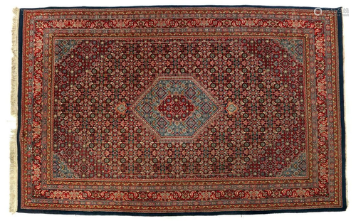 Oriental hand-knotted carpet