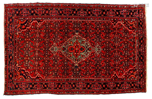 Oriental hand-knotted carpet