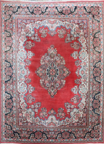 Hand-knotted Heriz carpet