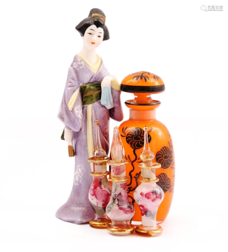 Orange glass perfume bottle with black decorated floral
