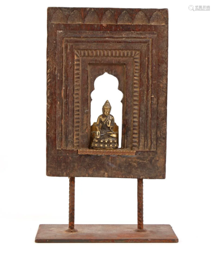 Asian wooden niche with bronze Buddha statue