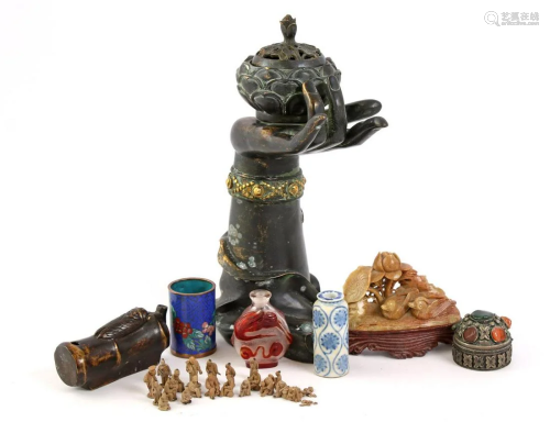 Bronze Asian incense pot on hand 25 cm high, bronze