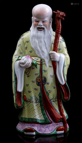 Porcelain statue of an Oriental man with cloth and