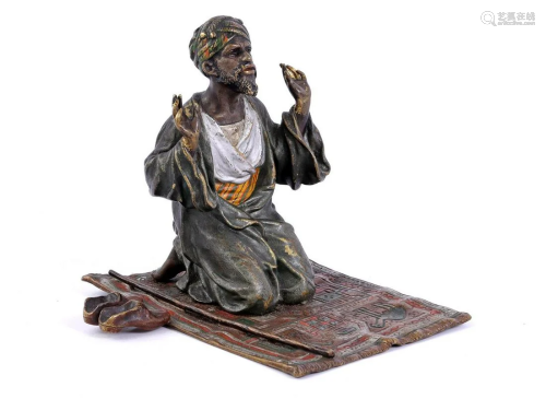 Marked Bergman Vienna, statue of a praying Arab man on