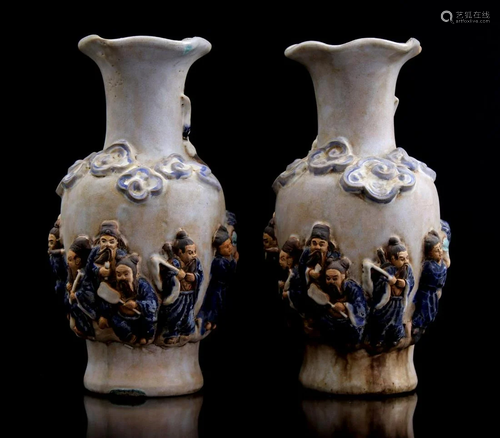 2 earthenware collar vases with relief decoration of