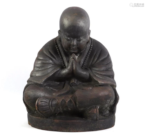 Black earthenware Buddha