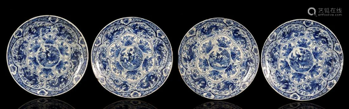 4 earthenware dishes with blue decoration with center