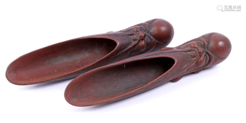 A pair of earthenware tea or spice scoops, China