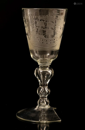 Antique glass with cut depiction of a sailing ship