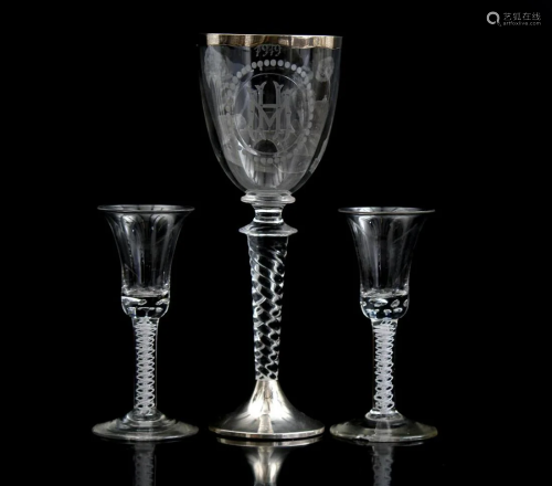 Etched glass goblet with monogram HM and decoration of
