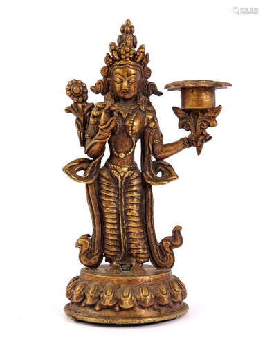 Asian candlestick in the shape of a standing goddess