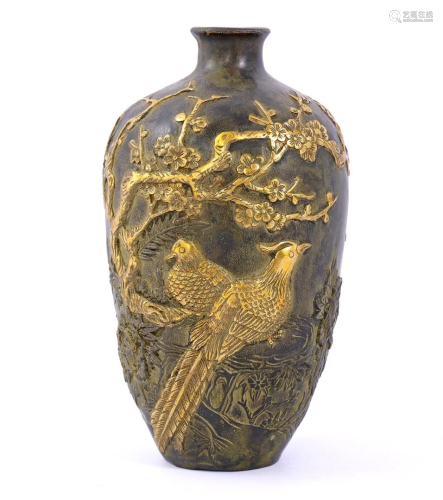 Bronze vase with gold decoration of birds in a floral