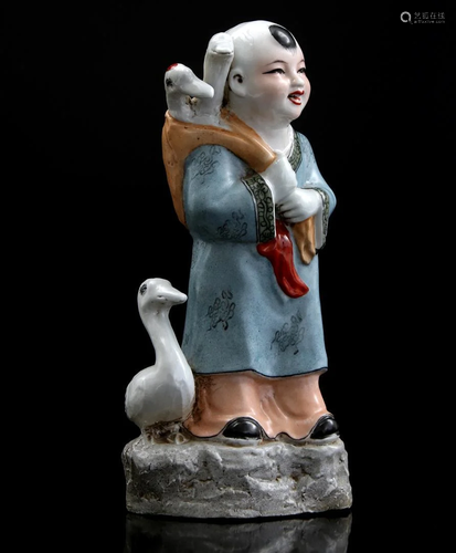 Porcelain figurine of a child with geese, China 20th