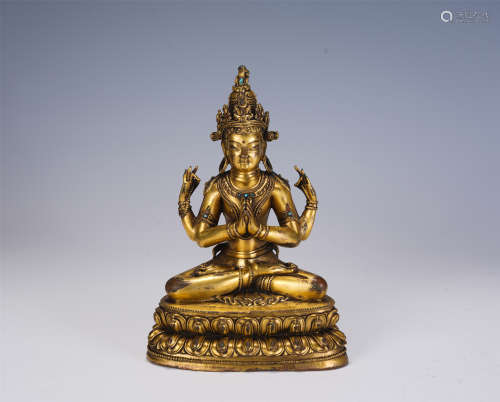 A CHINESE GILT BRONZE FIGURE OF SEATED BUDDHA STATUE