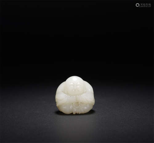 A CHINESE JADE FIGURE