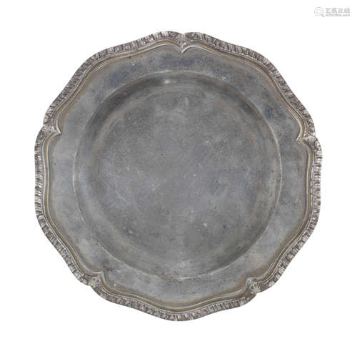 A George III pewter five lobed wavy edged plate, circa 1790