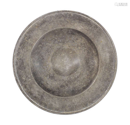 A good pewter bossed saucer, circa 1600