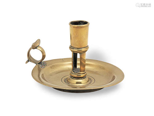 A mid-18th century cast brass chamberstick, English